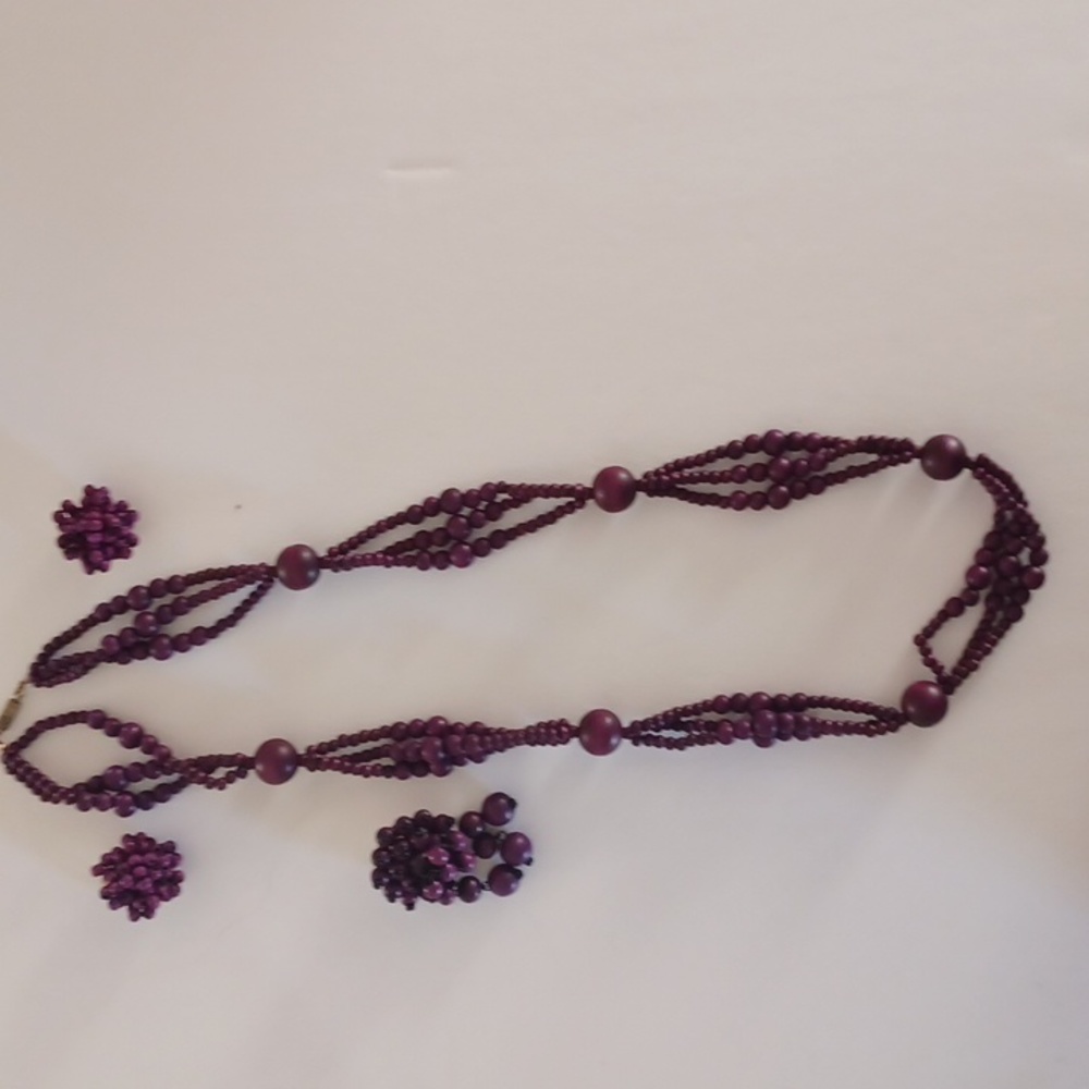 Necklace, brooch, and clip earrings